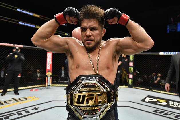 JACKSONVILLE, FLORIDA - MAY 09: Henry Cejudo celebrates after his knockout victory over Dominick Cruz in their UFC bantamweight championship fight during the UFC 249 event at VyStar Veterans Memorial Arena on May 09, 2020 in Jacksonville, Florida. (Photo by Jeff Bottari/Zuffa LLC)