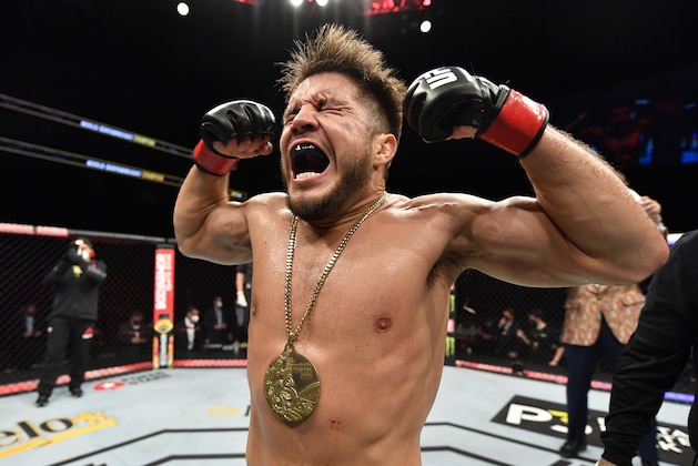 JACKSONVILLE, FLORIDA - MAY 09: Henry Cejudo celebrates after his knockout victory over Dominick Cruz in their UFC bantamweight championship fight during the UFC 249 event at VyStar Veterans Memorial Arena on May 09, 2020 in Jacksonville, Florida. (Photo by Jeff Bottari/Zuffa LLC)