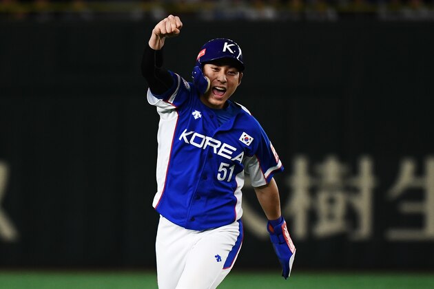 Jung-Hoo Lee of South Korea celebrates a home run of Ha Seong Kim during the WBSC Premier 12 Super Round Final baseball game between South Korea and Japan, at the Tokyo Dome in Tokyo on November 17, 2019. (Photo by CHARLY TRIBALLEAU / AFP) (Photo by CHARLY TRIBALLEAU/AFP via Getty Images)