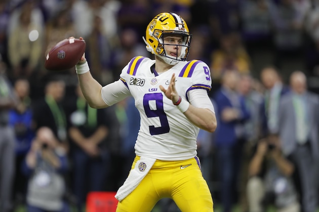 FILE - In this Jan. 13, 2020, file photo, LSU quarterback Joe Burrow throws a pass against Clemson during the second half of the NCAA College Football Playoff national championship game in New Orleans. The Cincinnati Bengals chose Burrow with the first pick in the NFL draft Thursday, April. 23, 2020. (AP Photo/Gerald Herbert, File)