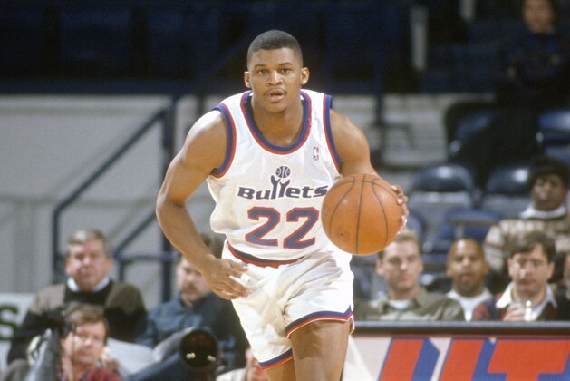 LANDOVER, MD - CIRCA 1992:  LaBradford Smith #22 of the Washington Bullets dribbles the ball up court against the New York Knicks during an NBA basketball game circa 1992 at the Capital Centre in Landover, Maryland. Smith played for the Bullets from 1991-93. (Photo by Focus on Sport/Getty Images) *** Local Caption *** LaBradford Smith