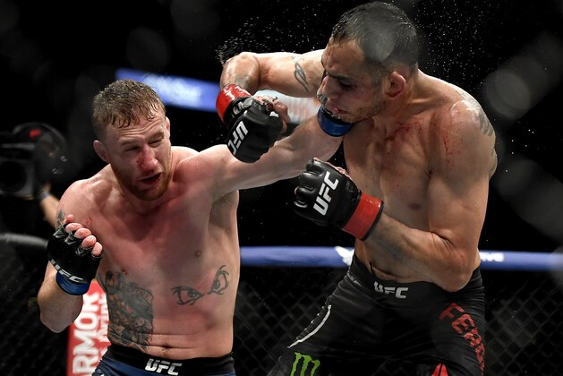 JACKSONVILLE, FLORIDA - MAY 09: Justin Gaethje (L) of the United States punches Tony Ferguson (R) of the United States in their Interim lightweight title fight during UFC 249 at VyStar Veterans Memorial Arena on May 09, 2020 in Jacksonville, Florida. (Photo by Douglas P. DeFelice/Getty Images)