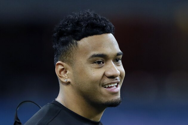 FILE - In this Feb. 27, 2020, file photo, Alabama quarterback Tua Tagovailoa watches a drill at the NFL football scouting combine in Indianapolis. Tagovailoa is a likely first round pick in the NFL Draft Thursday, April 23, 2020. (AP Photo/Charlie Neibergall, File) FILE - In this Feb. 27, 2020, file photo, Alabama quarterback Tua Tagovailoa watches a drill at the NFL football scouting combine in Indianapolis. Tagovailoa is a likely first round pick in the NFL Draft Thursday, April 23, 2020. (AP Photo/Charlie Neibergall, File)