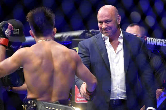 JACKSONVILLE, FLORIDA - MAY 09: UFC President Dana White (R) congratulates Henry Cejudo (L) of the United States after defeating Dominick Cruz of the United States in their bantamweight title fight during UFC 249 at VyStar Veterans Memorial Arena on May 09, 2020 in Jacksonville, Florida. (Photo by Douglas P. DeFelice/Getty Images)