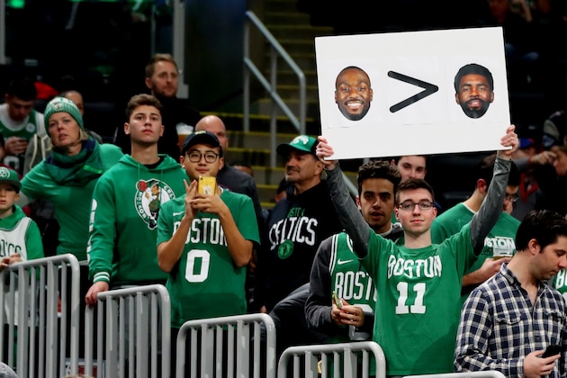 BOSTON, MASSACHUSETTS - NOVEMBER 27: A fan holds a sign with photos of Kyrie Irving and Kemba Walker before the game between the Boston Celtics and the Brooklyn Nets at TD Garden on November 27, 2019 in Boston, Massachusetts. (Photo by Maddie Meyer/Getty Images) BOSTON, MASSACHUSETTS - NOVEMBER 27: A fan holds a sign with photos of Kyrie Irving and Kemba Walker before the game between the Boston Celtics and the Brooklyn Nets at TD Garden on November 27, 2019 in Boston, Massachusetts. (Photo by Maddie Meyer/Getty Images)