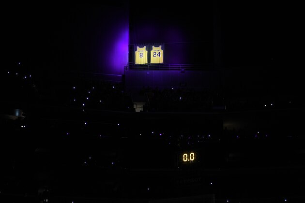 The retired jerseys of the late Los Angeles Lakers' Kobe Bryant hangs in the rafters, prior the Lakers' NBA basketball game against the Portland Trail Blazers in Los Angeles, Friday, Jan. 31, 2020. (AP Photo/Kelvin Kuo)