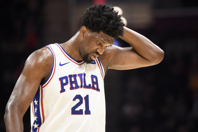 CLEVELAND, OHIO - FEBRUARY 26: Joel Embiid #21 of the Philadelphia 76ers reacts after an injury during the first half against the Cleveland Cavaliers at Rocket Mortgage Fieldhouse on February 26, 2020 in Cleveland, Ohio. NOTE TO USER: User expressly acknowledges and agrees that, by downloading and/or using this photograph, user is consenting to the terms and conditions of the Getty Images License Agreement. (Photo by Jason Miller/Getty Images)