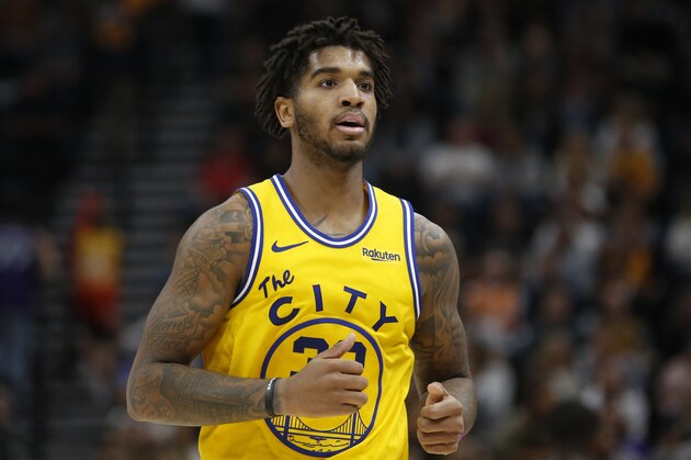 Golden State Warriors forward Marquese Chriss (32) runs up court in the first half during an NBA basketball game against the Utah Jazz Friday, Nov. 22, 2019, in Salt Lake City. (AP Photo/Rick Bowmer)