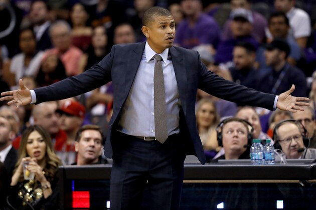 FILE - In this Oct. 18, 2017, file photo, Phoenix Suns coach Earl Watson reacts to a call during the first half of the team's NBA basketball game against the Portland Trail Blazers, in Phoenix. The Suns announced the firing of coach Earl Watson Sunday night, Oct. 22, 2017,  after hours of meetings at the team's headquarters. Assistant coach Jay Triano, a former head coach of the Toronto Raptors, was named interim coach. (AP Photo/Matt York, File)