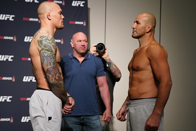 JACKSONVILLE, FLORIDA - MAY 12: (L-R) Opponents Anthony Smith and Glover Teixeira of Brazil face off during the official UFC Fight Night weigh-in on May 12, 2020 in Jacksonville, Florida. (Photo by Cooper Neill/Zuffa LLC via Getty Images)