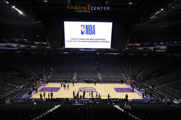 The Golden 1 Center center empties out after the NBA basketball game between the New Orleans Pelicans and Sacramento Kings was postponed at the last minute in Sacramento, Calif., Wednesday, March 11, 2020. The postponement was due to what the league said was an