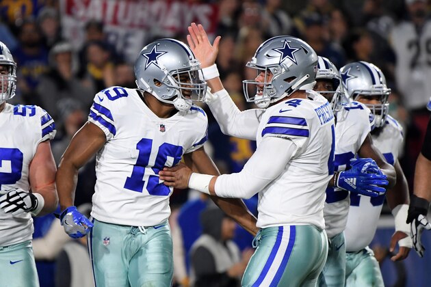 LOS ANGELES, CA - JANUARY 12: Amari Cooper #19 of the Dallas Cowboys celebrates a 29 yard touchdown pass from Dak Prescott #4 in the first quarter against the Los Angeles Rams in the NFC Divisional Playoff game at Los Angeles Memorial Coliseum on January 12, 2019 in Los Angeles, California.  (Photo by Harry How/Getty Images)