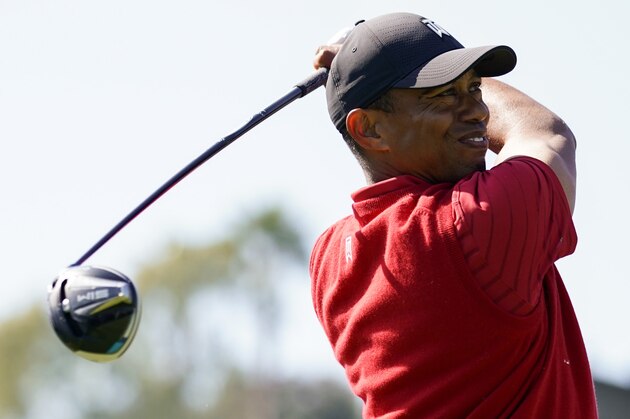 Tiger Woods tees off on the 18th hole during the final round of the Genesis Invitational golf tournament at Riviera Country Club, Sunday, Feb. 16, 2020, in the Pacific Palisades area of Los Angeles. (AP Photo/Ryan Kang)