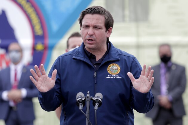 Florida Gov. Ron DeSantis speaks during a news conference at a COVID-19 testing site at Hard Rock Stadium, during the new coronavirus pandemic, Wednesday, May 6, 2020, in Miami Gardens, Fla. (AP Photo/Lynne Sladky)