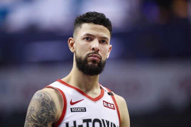 Houston Rockets guard Austin Rivers stands on the court during the second half of an NBA basketball game against the Charlotte Hornets in Charlotte, N.C., Saturday, March 7, 2020. Charlotte won 108-99. (AP Photo/Nell Redmond)