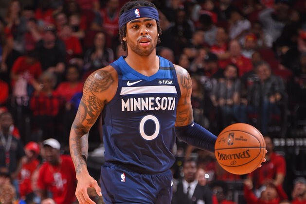 HOUSTON, TX - MARCH 10: D'Angelo Russell #0 of the Minnesota Timberwolves handles the ball during the game against the Houston Rockets on March 10, 2020 at the Toyota Center in Houston, Texas. NOTE TO USER: User expressly acknowledges and agrees that, by downloading and or using this photograph, User is consenting to the terms and conditions of the Getty Images License Agreement. Mandatory Copyright Notice: Copyright 2020 NBAE (Photo by Bill Baptist/NBAE via Getty Images)