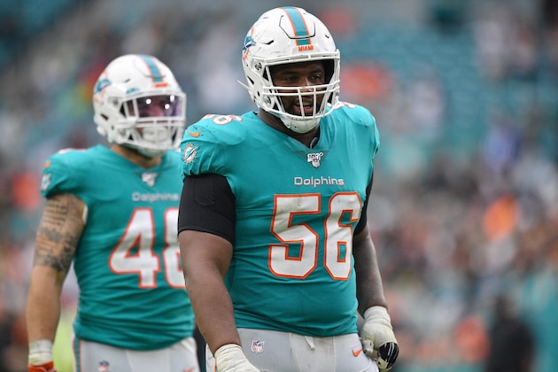 MIAMI, FLORIDA - DECEMBER 22: Davon Godchaux #56 of the Miami Dolphins lines up against the Cincinnati Bengals during overtime at Hard Rock Stadium on December 22, 2019 in Miami, Florida. (Photo by Mark Brown/Getty Images)
