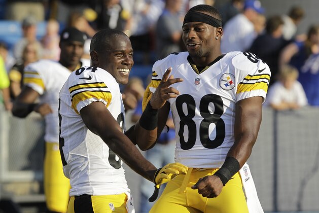 Pittsburgh Steelers' Antonio Brown (84) talks with Steelers' Emmanuel Sanders (88) during warm-ups before a preseason NFL football game against the Buffalo Bills in Orchard Park, N.Y., Saturday, Aug. 25, 2012. (AP Photo/Doug Benz)