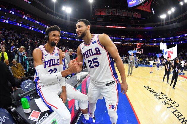 PHILADELPHIA, PA - DECEMBER 8: Matisse Thybulle #22 of the Philadelphia 76ers and Ben Simmons #25 of the Philadelphia 76ers shake hands after a game against the Toronto Raptors on December 8, 2019 at the Wells Fargo Center in Philadelphia, Pennsylvania NOTE TO USER: User expressly acknowledges and agrees that, by downloading and/or using this Photograph, user is consenting to the terms and conditions of the Getty Images License Agreement. Mandatory Copyright Notice: Copyright 2019 NBAE (Photo by Jesse D. Garrabrant/NBAE via Getty Images)