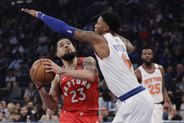 New York Knicks' Elfrid Payton, right, defends against Toronto Raptors' Fred VanVleet during the first half of an NBA basketball game Friday, Jan. 24, 2020, in New York. (AP Photo/Frank Franklin II)