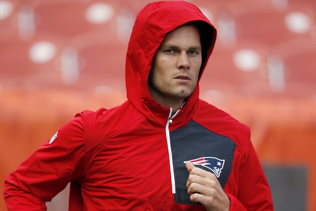 New England Patriots quarterback Tom Brady jogs onto the field before an NFL football game against the Cleveland Browns Sunday, Oct. 9, 2016, in Cleveland. (AP Photo/Ron Schwane)