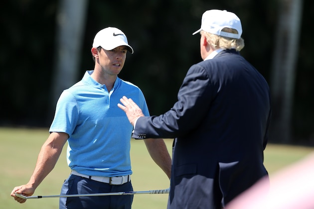 DORAL, FL - MARCH 06:  Republican presidential candidate Donald Trump makes an appearance prior to the start of play and speaks with golfer Rory McIlroy of Northern Ireland during the final round of the World Golf Championships-Cadillac Championship at Trump National Doral Blue Monster Course  on March 6, 2016 in Doral, Florida.  (Photo by Mike Ehrmann/Getty Images)