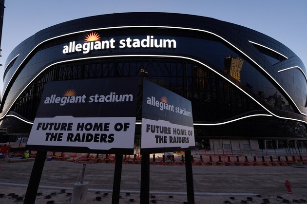 LAS VEGAS, NEVADA - APRIL 23:  Crews test out architectural light ribbons and exterior sign lighting as construction continues at Allegiant Stadium, the USD 2 billion, glass-domed future home of the Las Vegas Raiders on April 23, 2020 in Las Vegas, Nevada. The Raiders and the UNLV Rebels football teams are scheduled to begin play at the 65,000-seat facility in their 2020 seasons.  (Photo by Ethan Miller/Getty Images)