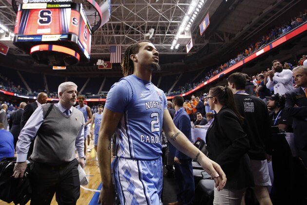 North Carolina guard Cole Anthony (2) walks off of the court following North Carolina's 81-53 loss to Syracuse in an NCAA college basketball game at the Atlantic Coast Conference tournament in Greensboro, N.C., Wednesday, March 11, 2020. (AP Photo/Ben McKeown)