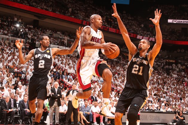 MIAMI, FL - JUNE 20: Ray Allen #34 of the Miami Heat goes up against Tim Duncan #21 of the San Antonio Spurs during Game Seven of the 2013 NBA Finals on June 20, 2013 at American Airlines Arena in Miami, Florida. NOTE TO USER: User expressly acknowledges and agrees that, by downloading and or using this photograph, User is consenting to the terms and conditions of the Getty Images License Agreement. Mandatory Copyright Notice: Copyright 2013 NBAE (Photo by Nathaniel S. Butler/NBAE via Getty Images)