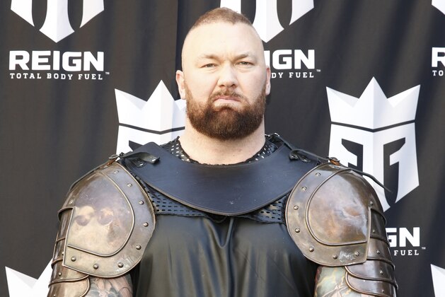 NEW YORK, NEW YORK - APRIL 16: Fitness Expert and former WWE star Natalie Eva Marie and Game of Thrones actor Hafþór Júlíus Björnsson (Thor) “The Mountain” lead a march through the streets of Times Square to celebrate the launch of Monster Energy’s new performance beverage REIGN Total Body Fuel on April 16, 2019 in New York City. (Photo by Brian Ach/Getty Images for REIGN Total Body Fuel)