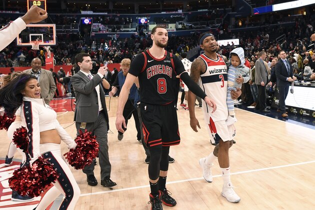 Washington Wizards guard Bradley Beal (3) and Chicago Bulls guard Zach LaVine (8) walk on the court after an NBA basketball game, Tuesday, Feb. 11, 2020, in Washington. The Wizards won 126-114. (AP Photo/Nick Wass)