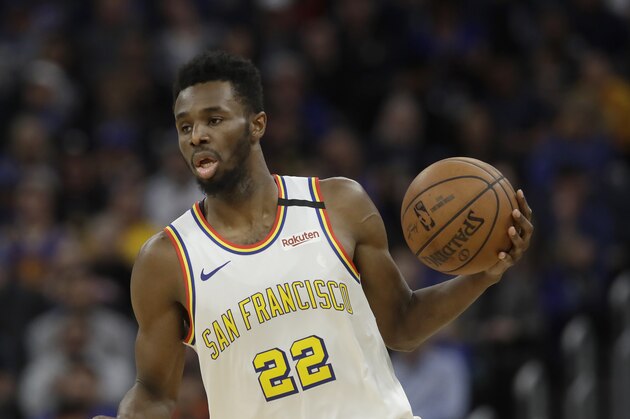 Golden State Warriors guard Andrew Wiggins (22) against the Toronto Raptors during an NBA basketball game in San Francisco, Thursday, March 5, 2020. (AP Photo/Jeff Chiu)
