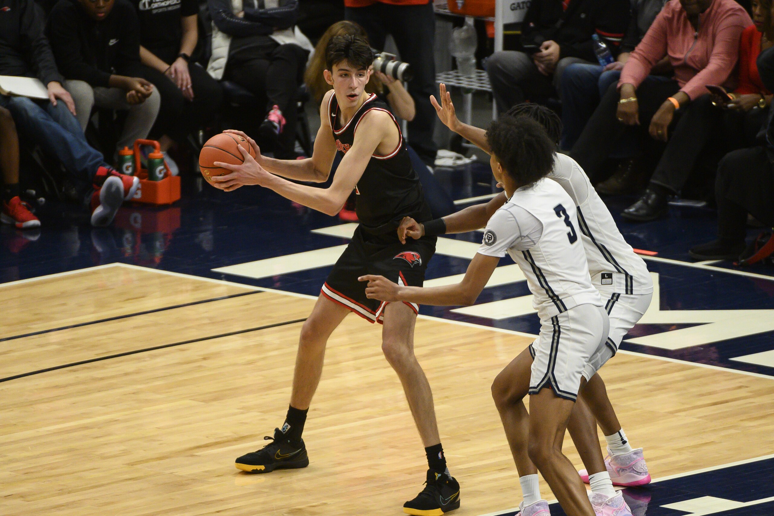 MINNEAPOLIS, MINNESOTA - JANUARY 04: Chet Holmgren #34 of Minnehaha Academy Red Hawks squares up with the ball while he's defended by Brandon Boston, Jr. #3 of Sierra Canyon Trailblazers in the second half of the game at Target Center on January 04, 2020 in Minneapolis, Minnesota. (Photo by Stephen Maturen/Getty Images) MINNEAPOLIS, MINNESOTA - JANUARY 04: Chet Holmgren #34 of Minnehaha Academy Red Hawks squares up with the ball while he's defended by Brandon Boston, Jr. #3 of Sierra Canyon Trailblazers in the second half of the game at Target Center on January 04, 2020 in Minneapolis, Minnesota. (Photo by Stephen Maturen/Getty Images)