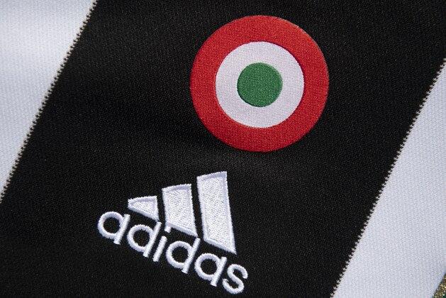 MANCHESTER, ENGLAND - MAY 06: The adidas logo with an Italian target on the Juventus first team home shirt displayed on May 6, 2020 in Manchester, England (Photo by Visionhaus)