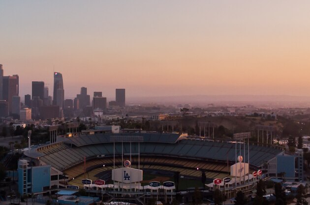 An aerial view shows the Dodger Stadium in Los Angeles, California, on May 9, 2020, during the novel coronavirus pandemic. - Events that involve mass gatherings, like sporting events and concerts, are unlikely to reopen until the threat of the novel coronavirus has largely passed. (Photo by Apu GOMES / AFP) (Photo by APU GOMES/AFP via Getty Images)