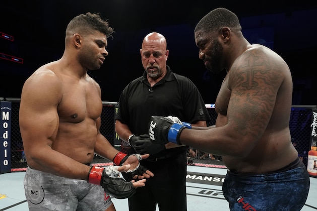 JACKSONVILLE, FLORIDA - MAY 16: (L-R) Opponents Alistair Overeem of the Netherlands and Walt Harris face off prior to their heavyweight fight during the UFC Fight Night event at VyStar Veterans Memorial Arena on May 16, 2020 in Jacksonville, Florida. (Photo by Cooper Neill/Zuffa LLC via Getty Images)