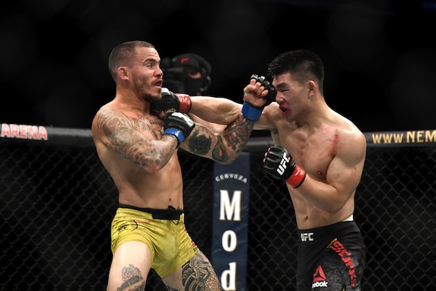 JACKSONVILLE, FLORIDA - MAY 16: Song Yadong (R) of China fights Marlon Vera (L) of Ecuador in their Featherweight bout during UFC Fight Night at VyStar Veterans Memorial Arena on May 16, 2020 in Jacksonville, Florida. (Photo by Douglas P. DeFelice/Getty Images)