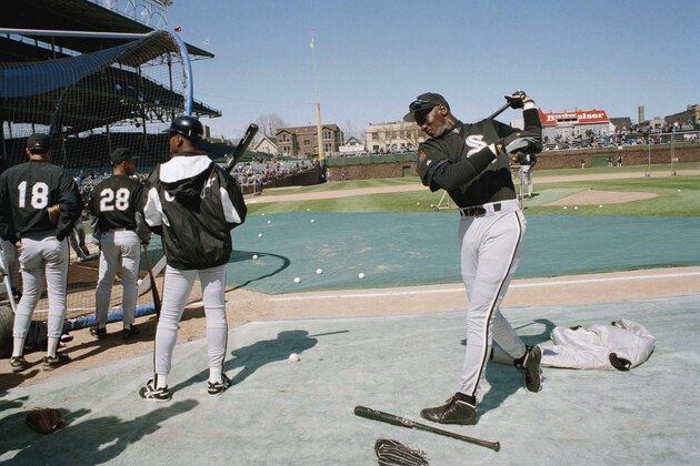 Chicago White Sox' Michael Jordan takes batting practice before the start of the game against the Chicago Cubs in their annual cross-town classic, Thursday, April 7, 1994 in Chicago. Jordan will make his league, Friday, April 8, with the Birmingham Barons. (AP Photo/Barry Jarvinen)