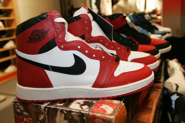 In a wide array of colors, the original models of the shoe that Michael Jordan wore in in the NBA in 1985 sit in a row at a shoe collectors' show at Niketown in Denver on Friday, Feb. 18, 2005. (AP Photo/David Zalubowski)