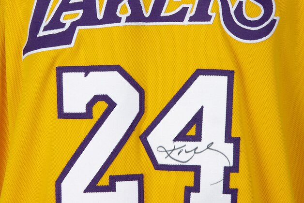UNSPECIFIED,  - MAY 01: (EDITORIAL USE ONLY) This handout image provided by Julien’s Auctions shows an Adidas brand Kobe Bryant Los Angeles Lakers home jersey game-worn during the 2006-2007 season, Bryant has signed the number “24” to the front in black marker. The Sports Legends auction, hosted by Julien’s Auctions, will take place on May 21, 2020, and features over 300 historic sports artifacts including Kobe Bryant game-worn items, as well as a collection of FIFA World Cup, Confederations Cup and Olympic Medals.  (Photo by Handout/Julien’s Auctions via Getty Images)