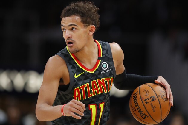 ATLANTA, GA - MARCH 09: Trae Young #11 of the Atlanta Hawks controls the ball during the second half of an NBA game against the Charlotte Hornets at State Farm Arena on March 9, 2020 in Atlanta, Georgia. NOTE TO USER: User expressly acknowledges and agrees that, by downloading and/or using this photograph, user is consenting to the terms and conditions of the Getty Images License Agreement. (Photo by Todd Kirkland/Getty Images)