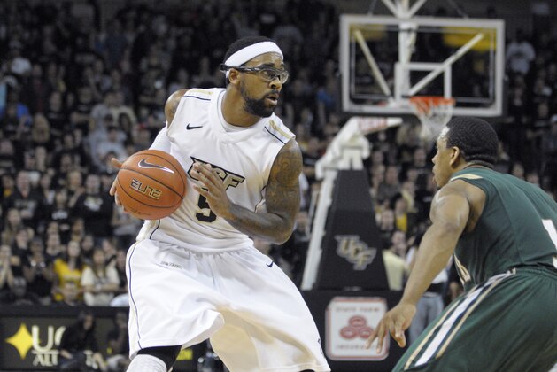 Central Florida Marcus Jordan, left, drives past UAB's Aaron Johnson during an NCAA college basketball game in Orlando, Fla., Saturday, Jan. 29, 2011.(AP Photo/Phelan M. Ebenhack)