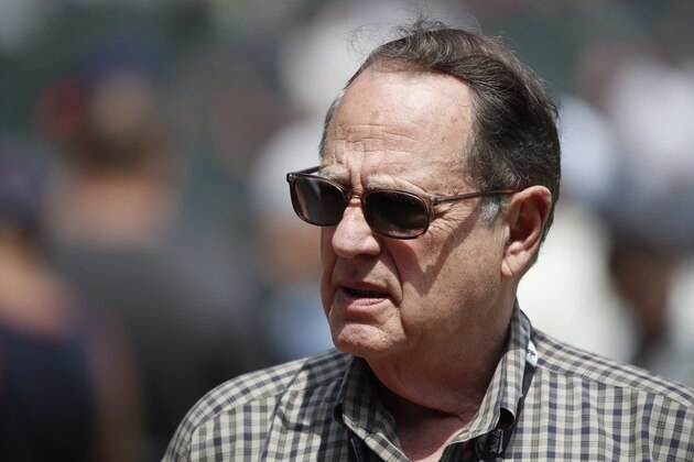 Chicago White Sox and Chicago Bulls owner Jerry Reinsdorf talks on the field before a baseball game between the Minnesota Twins and the Chicago White Sox Saturday, June 29, 2019, in Chicago. (AP Photo/Jeff Haynes)