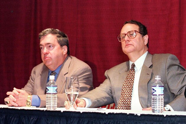Chicago Bulls General Manager Jerry Krause (L), Chairman Jerry Reinsdorf (C), and New Director of Basketball Operations Tim Floyd discuss the team's coaching situation at the United Center in Chicago, IL, 23 July. Under the terms of Floyd's five-year contract, he will become the new head coach if Phil Jackson decides not to return.   AFP PHOTO/John ZICH (Photo by JOHN ZICH / AFP) (Photo by JOHN ZICH/AFP via Getty Images)