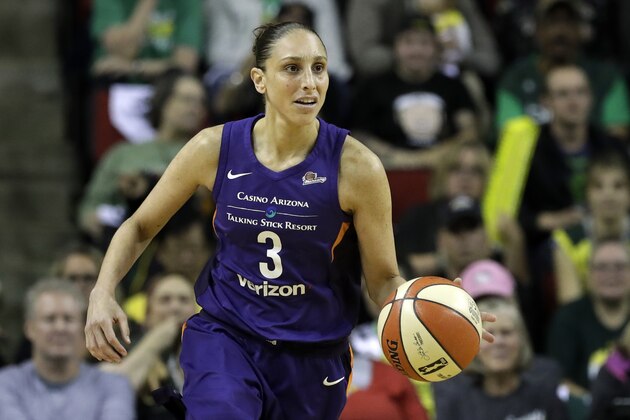 Phoenix Mercury's Diana Taurasi in action against the Seattle Storm in the first half of a WNBA basketball playoff semifinal Sunday, Aug. 26, 2018, in Seattle. (AP Photo/Elaine Thompson)