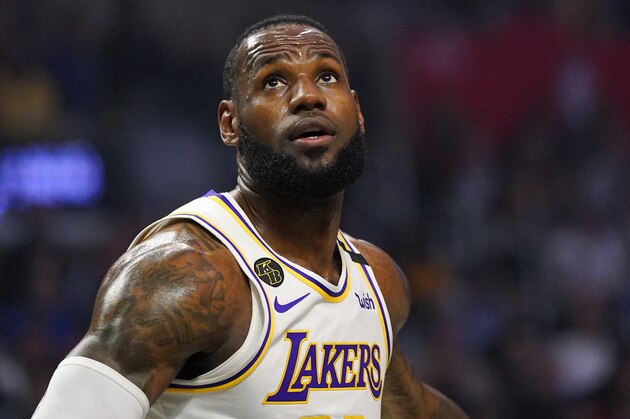 Los Angeles Lakers forward LeBron James watches for a rebound during the first half of an NBA basketball game against the Los Angeles Clippers Sunday, March 8, 2020, in Los Angeles. (AP Photo/Mark J. Terrill)