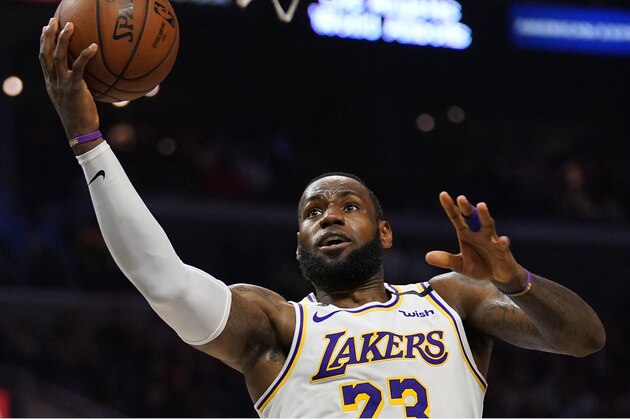 Los Angeles Lakers forward LeBron James shoots during the second half of an NBA basketball game against the Los Angeles Clippers Sunday, March 8, 2020, in Los Angeles. The Lakers won 112-103. (AP Photo/Mark J. Terrill)