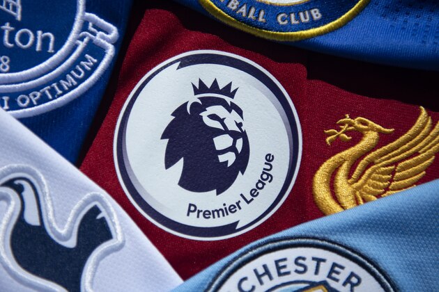 MANCHESTER, ENGLAND - MAY 14: The Premier League logo amongst shirts from Premier League clubs on May 14, 2020 in Manchester, England. (Photo by Visionhaus)