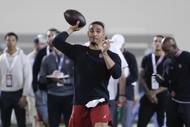 Oklahoma quarterback Jalen Hurts runs through drills during Pro Day in Norman, Okla., Wednesday, March 11, 2020. (AP Photo/Alonzo Adams)