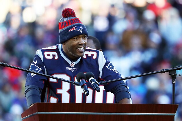 FOXBORO, MA - DECEMBER 04:  Lawyer Milloy #36 of the New England Patriots' 2001 Super Bowl winning team is honored along with his teammates during halftime during the game between the New England Patriots and the Los Angeles Rams at Gillette Stadium on December 4, 2016 in Foxboro, Massachusetts.  (Photo by Adam Glanzman/Getty Images)